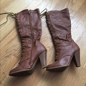 Brown front laced heeled boots
